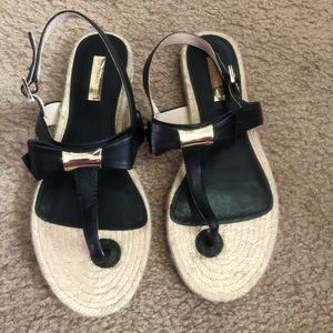 Black and gold sandals